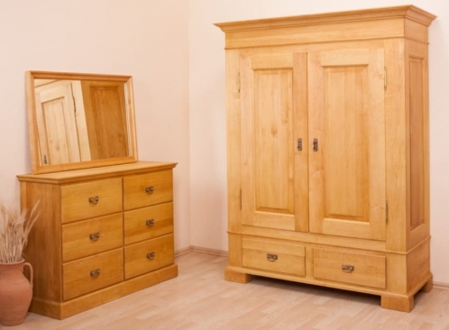 wardrobe and chest of draws in the room
