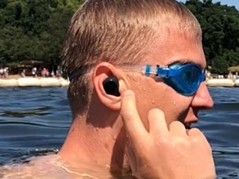 swimming with earphones