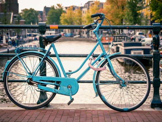 blue European bike by the canal