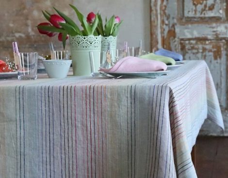 set table covered by linen table cloth
