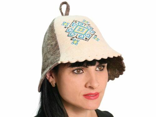 woman in a felt sauna hat with traditional Ukrainian decoration