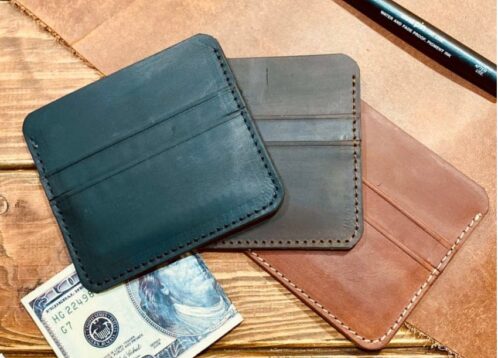 three handmade slim leather wallets for men