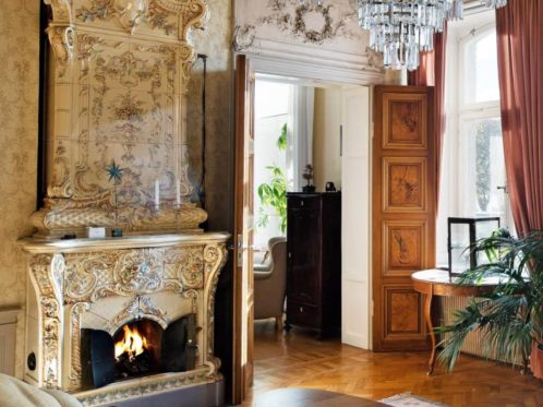 traditional Swedish fireplace in a spacious room