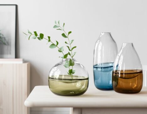 three swedish made vases on a desk